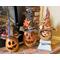 This shows three fall pumpkin witches decorating a fireplce hearth. Each witch has a different hat and a special name. 